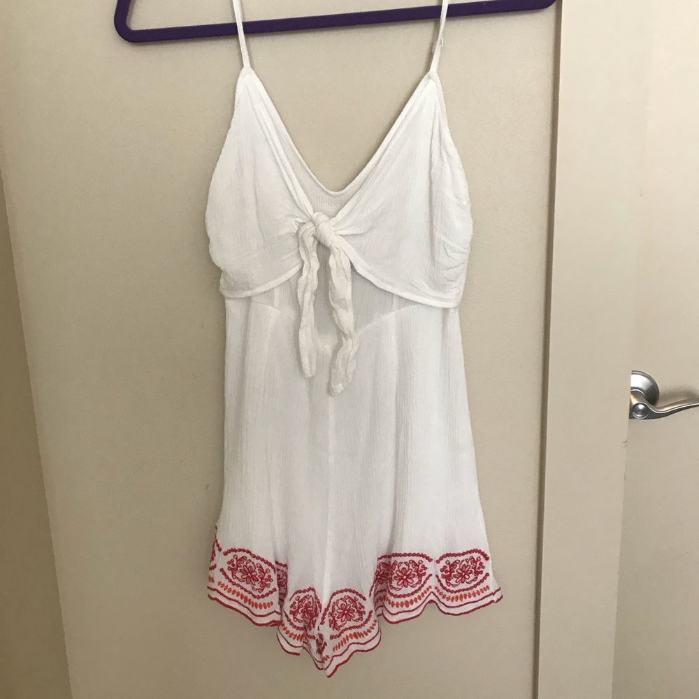 White romper with red lining *NEVER WORN*